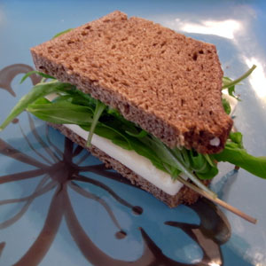 Goat cheddar and greens on pumpernickel
