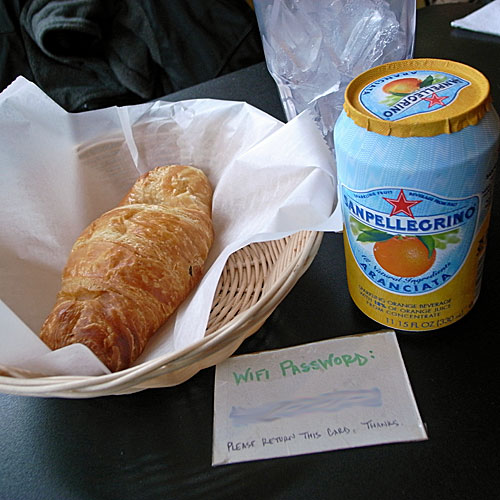 Ham & cheese croissant, aranciata and the wifi password at Atomic Bean Cafe